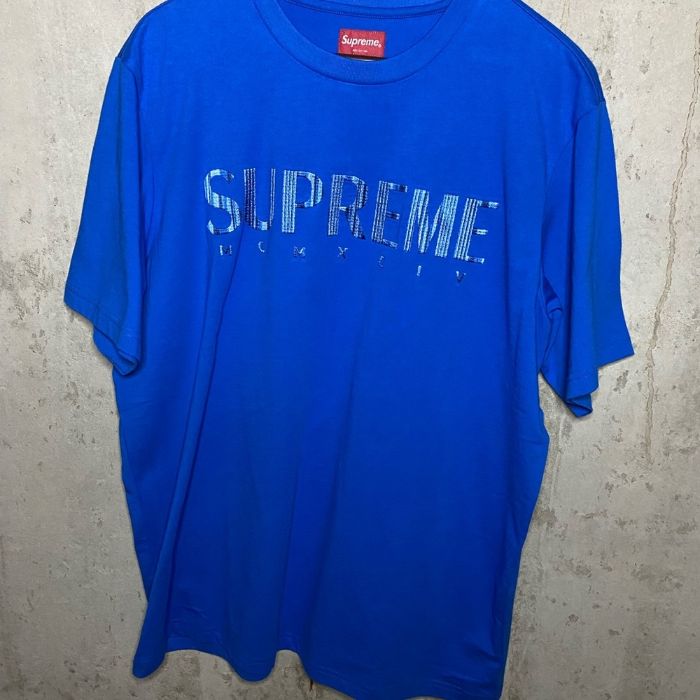 Blue Supreme t shirt.(puffy text)